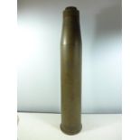 A BRASS INERT TESTING THREE INCH SHELL DATED 1956, HEIGHT 68CM