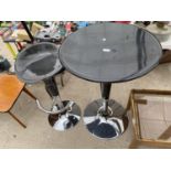 A RETRO 24" DIAMETER BLACK PLASTIC TABLE ON POLISHED CHROME BASE COMPLETE WITH MATCHING PUMP STOOL