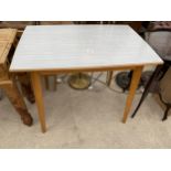A MID 20TH CENTURY FORMICA TOP TABLE 36" X 24"