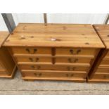 A MODERN PINE CHEST OF FOUR SHORT AND TWO LONG DRAWERS 36" WIDE