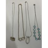 FOUR SILVER NECKLACES WITH PENDANTS