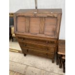 A MID 20TH CENTURY OAK BUREAU 30" WIDE