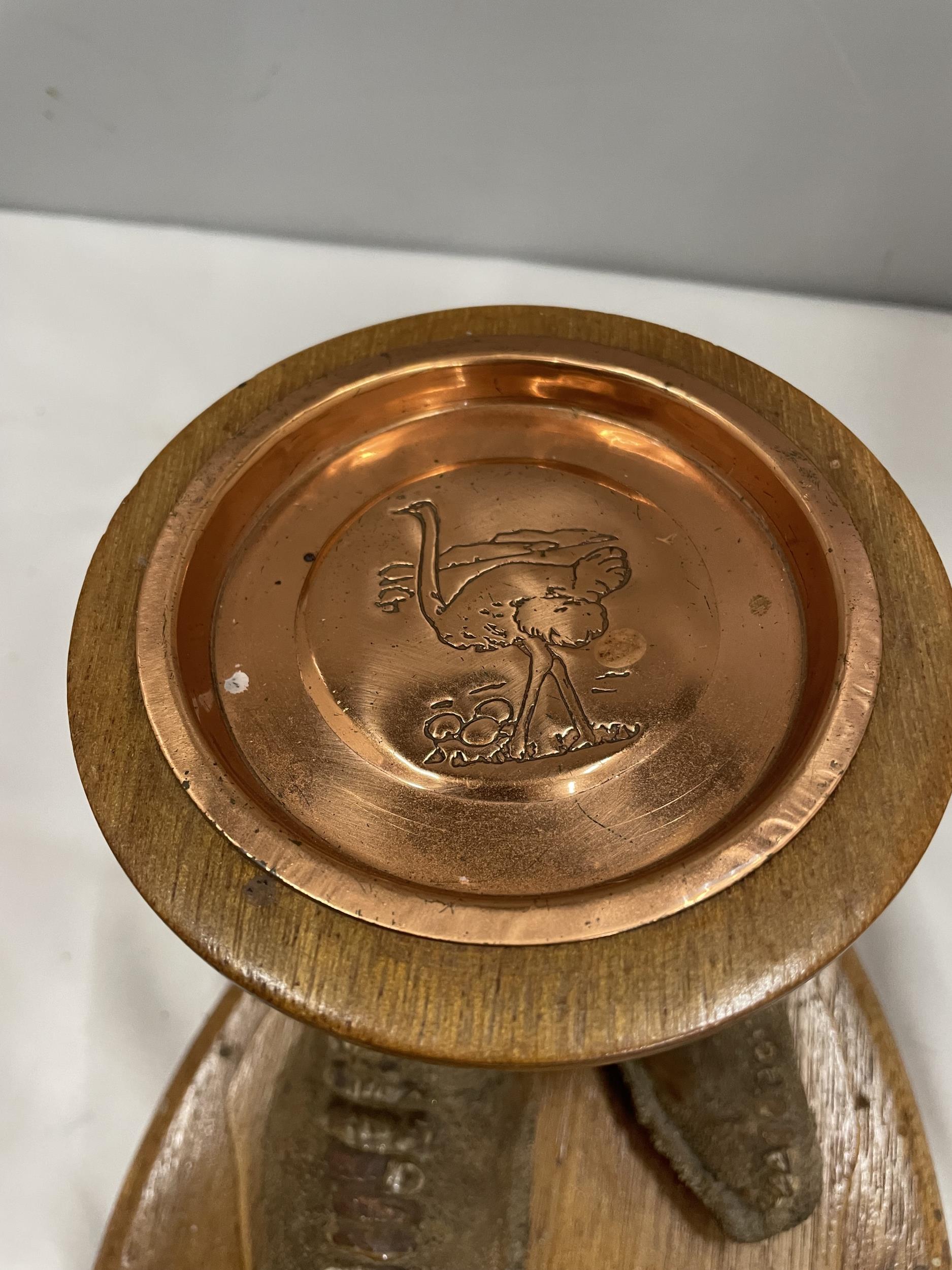 A TAXIDERMY OSTRICH FOOT ON AN OAK BASE MOUNTED WITH AN OAK PLINTH WITH BAIZE BASE AND A COPPER TRAY - Image 2 of 4