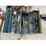 A METAL TOOL BOX CONTAING AN ASSORTMENT OF TOOLS TO INCLUDE SPANNERS, SOCKETS AND PLIERS ETC