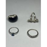 FOUR MARKED SILVER RINGS