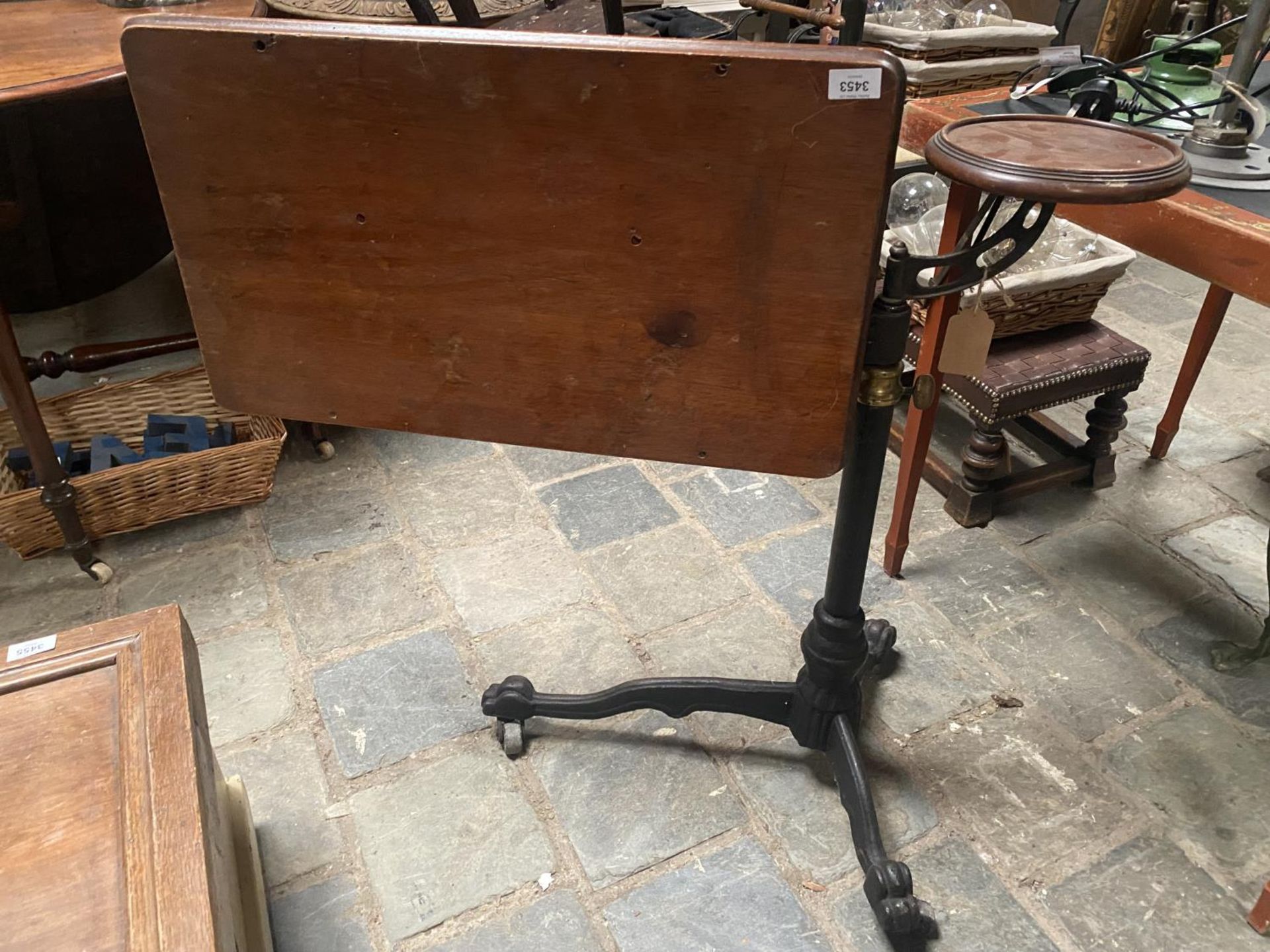 GOOD LATE VICTORIAN ADJUSTABLE READING STAND ON CASTORS