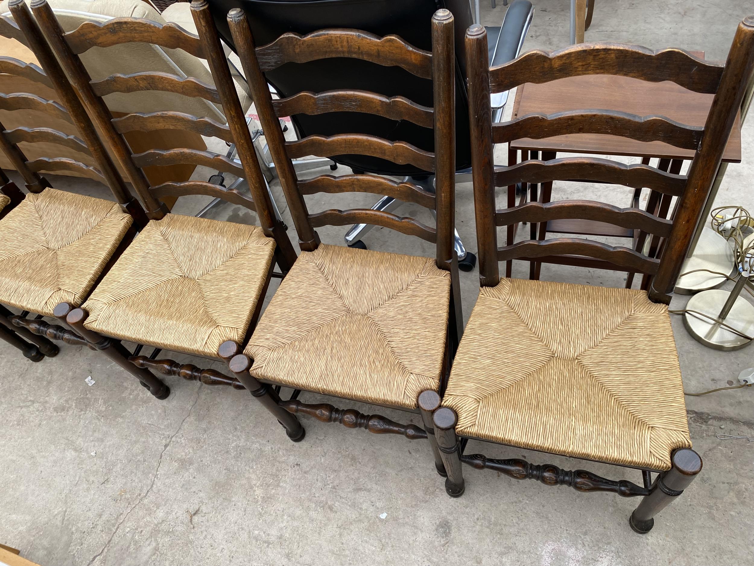 A SET OF EIGHT LANCASHIRE STYLE LADDER BACK DINING CHAIRS WITH RUSH SEATS - Image 3 of 5