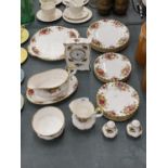A QUANTITY OF ROYAL ALBERT 'OLD COUNTRY ROSES' TO INCLUDE A CLOCK, CAKE PLATES, SIDE PLATES, SAUCE