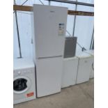 A WHITE BEKO UPRIGHT FRIDGE FREEZER BELIEVED IN WORKING ORDER BUT NO WARRANTY