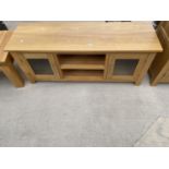 A MODERN OAK ENTERTAINMENT UNIT, 53.5" WIDE