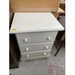 A MODERN WHITE CHEST OF THREE DRAWERS, 24" WIDE