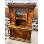 A VICTORIAN WALNUT DRESSER, THE UPPER PORTION WITH SIDE CUPBOARD, CENTRAL DOOR WITH BEVEL GLASS WITH