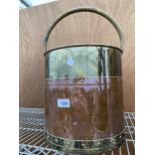 A VINTAGE COPPER AND BRASS COAL BUCKET