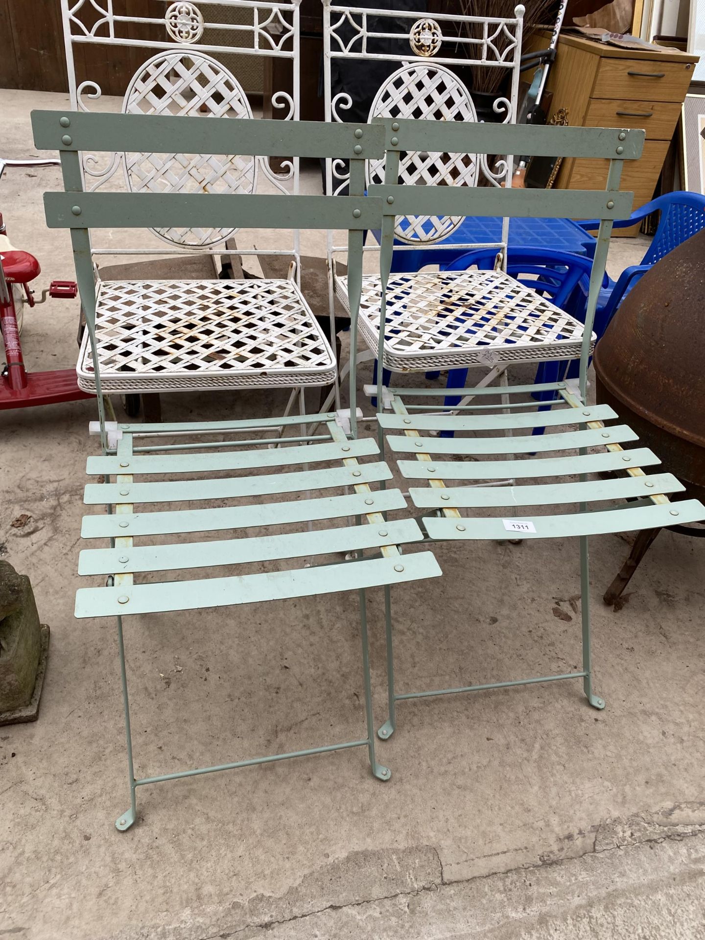 FOUR FOLDING METAL GARDEN CHAIRS (TWO PAIRS)