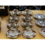 A COLLECTION OF DELPHINE CHINA CUPS, SAUCERS AND PLATES