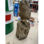 A RECONSTITUTED STONE OWL FIGURE