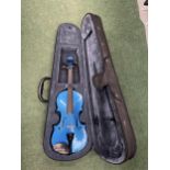 A RAINBOW FANTASIA BLUE VIOLIN IN 1/2 SIZE. .MADE FROM HAND CARVED MAPLE AND SPRUCE WITH AN EBONISED