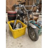 A SMALL MOTORBIKE AND SPARE PARTS FOR RESTORATION