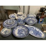 A QUANTITY OF BLUE AND WHITE POTTERY TO INCLUDE BOWLS, PLATES, ETC PLUS A TEAPOT - NO LID