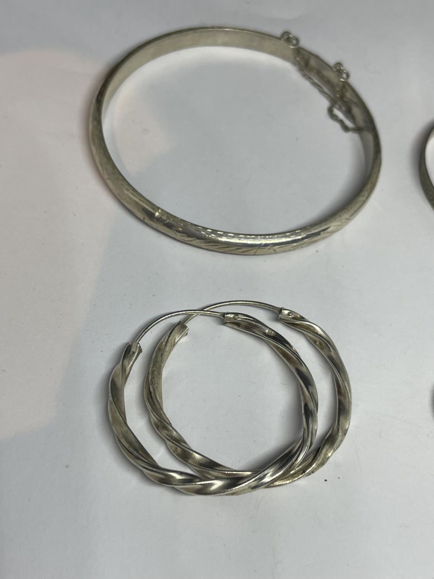 TWO MARKED SILVER BANGLES AND TWO PAIRS OF SILVER EARRINGS - Image 3 of 3