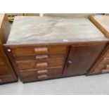 A MID 20TH CENTURY STORAGE CHEST OF FIVE DRAWERS AND ONE CUPBOARD, 36" WIDE
