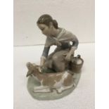 A LLADRO FIGURE 'CARESSING A LITTLE CALF' FINGERS A/F