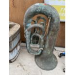 A VINTAGE BRASS TUBA