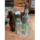 QTY OF 6 GLASS BOTTLES