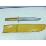 A LARGE ITALIAN MADE BOWIE KNIFE AND SCABBARD 24CM BLADE
