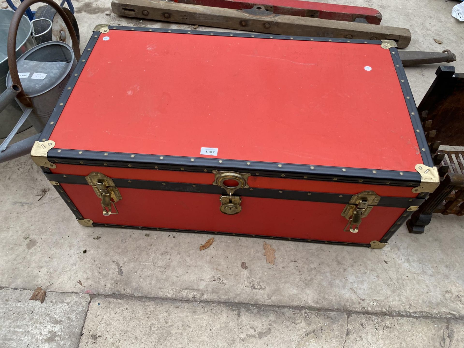 A LARGE TRAVEL TRUNK