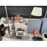 AN ASSORTMENT OF ITEMS TO INCLUDE A GTECH AIR RAM, A MICROWAVE AND A LAMP