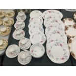 A QUANTITY OF ROYAL ALBERT 'TRENTSIDE ROSE' CHINA TO INCLUDE A SERVING PLATE, DINNER PLATES, SIDE