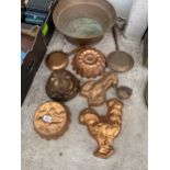 AN ASSORTMENT OF COPPER ITEMS TO INCLUDE JELLY MOULDS, A LARGE BOWL AND A MINITURE BED WARMING PAN