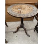 A GEORGE III OAK TRIPOD TABLE, 19" DIAMETER WITH CARVING TO THE TOP