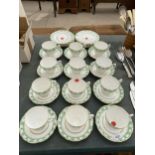 TWELVE GLADSTONE BONE CHINA TRIOS