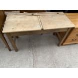 A MID 20TH CENTURY DOUBLE CHILDS SCHOOL DESK