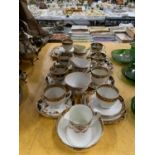 A ROYAL ALBERT TEA SET TO INCLUDE CUPS AND SAUCERS, CAKE PLATES, SIDE PLATES, SUGAR BOWL, CREAM