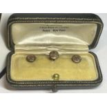 THREE YELLOW METAL COLLAR STUDS IN A PRESENTATION BOX