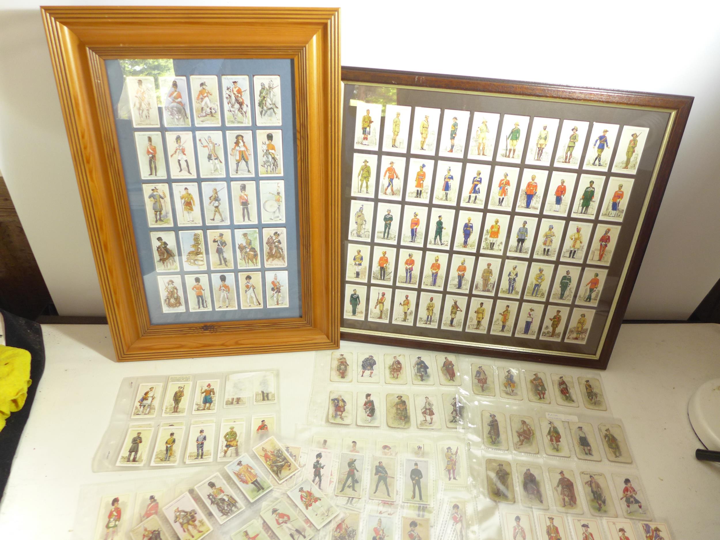 TWO FRAMED PLAYERS CIGARETTE CARDS RELATING TO THE MILITARY, PLUS VARIOUS SIMILAR SUBJECT SHEETS