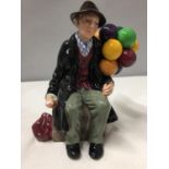 A ROYAL DOULTON FIGURE 'THE BALLOON MAN' H.N. 1954