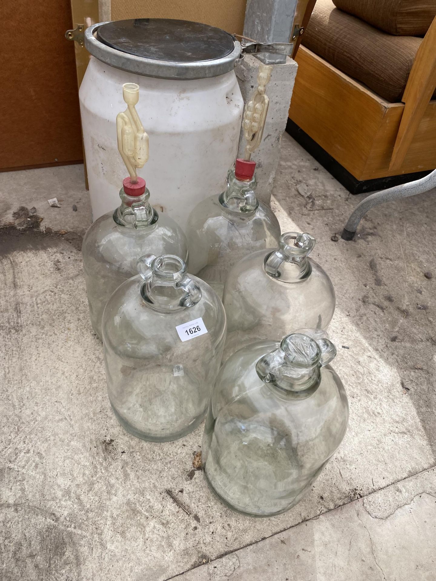 FIVE GLASS DEMI JOHNS AND A LIDED BIN