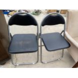 A PAIR OF TUBULAR FOLDING CHAIRS