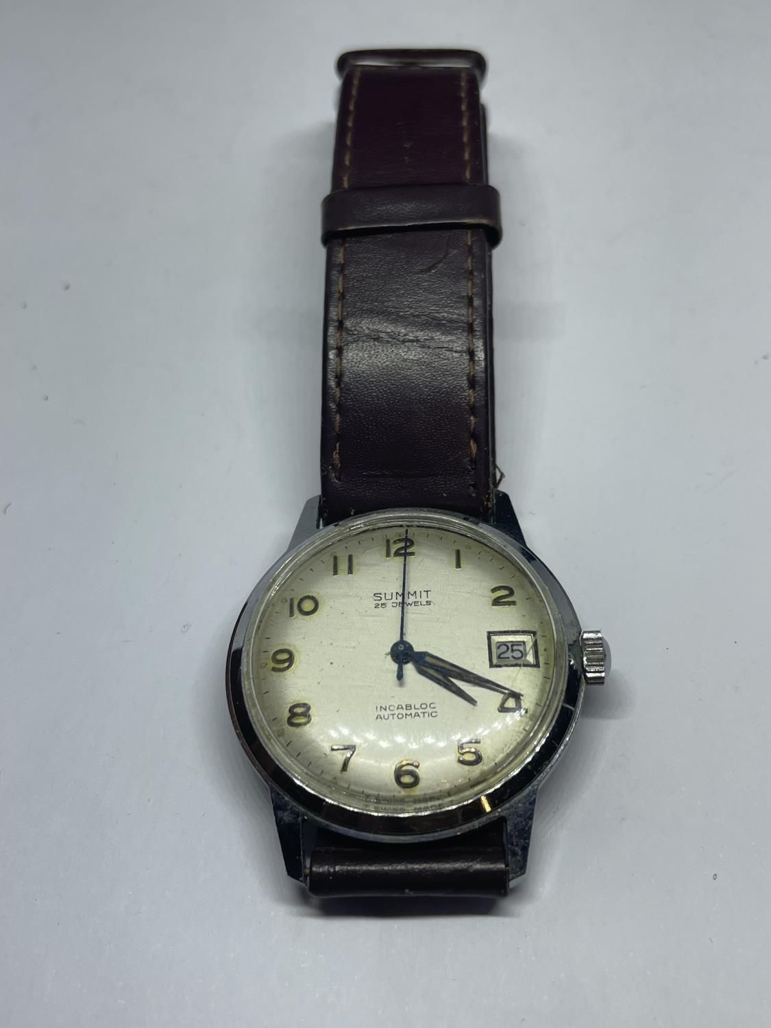 A VINTAGE SUMMIT WRIST WATCH SEEN WORKING BUT NO WARRANTY