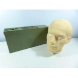 A GREEN PAINTED AMMUNITION BOX AND A POLYSTYRENE HEAD (2)