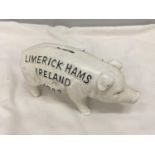 A CAST LIMERICK HAMS PIG MONEY BOX
