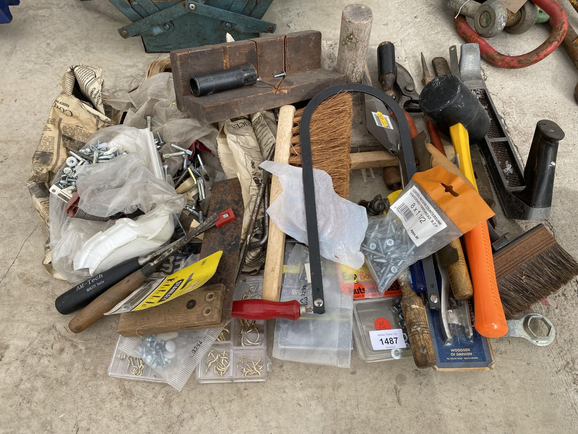 A LARGE ASSORTMENT OF TOOLS AND HARDWARE TO INCLUDE SET SQUARES, TROWELS, MALLETS AND RASPS ETC