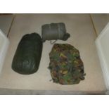 A MILITARY BERGEN BACKPACK AND TWO MILITARY SLEEPING BAGS (3)