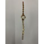 A PRECIMAX 17 JEWEL INCABLOC LADIES 9 CARAT GOLD WATCH AND STRAP APPROXIMATE WEIGHT 8.5 GRAMS