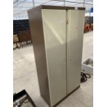 A RONEO METAL OFFICE TWO DOOR CUPBOARD