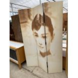 A THREE DIVISION SCREEN DEPICTING TWO IMAGES OF AUDREY HEPBURN